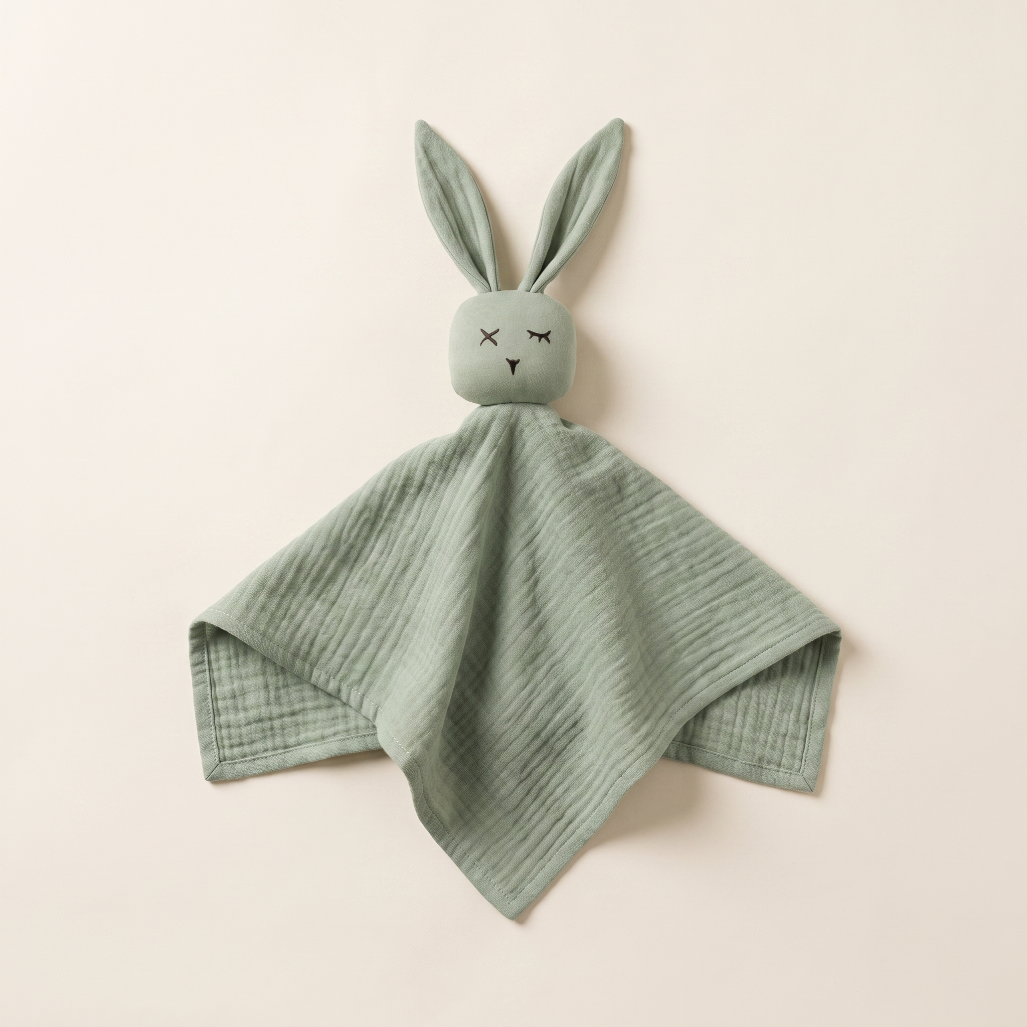 Doudou de gasa de algodón orgánico verde con cabeza de conejo y orejas largas
